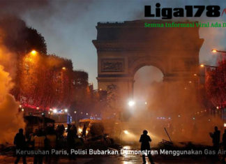 Kerusuhan Paris, Polisi Bubarkan Demonstran Menggunakan Gas Air Mata demonstari, prancis, paris, kepolisian, presiden macron